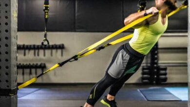 Trx shoulder press, using low anchor point